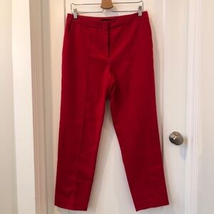 Red BCBGMAXAZRIA dress pant with front piping. Size 10.